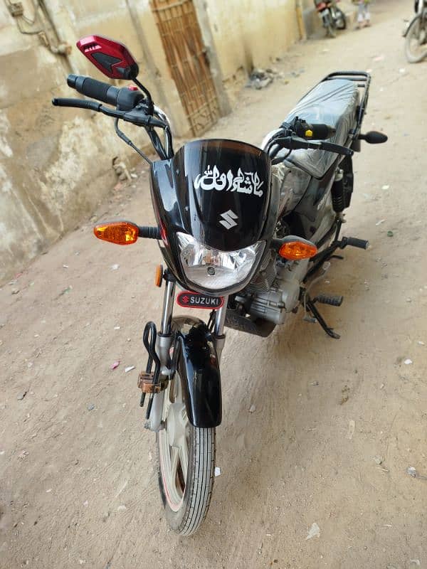 Suzuki 110 condition new 1000 km register Karachi 1