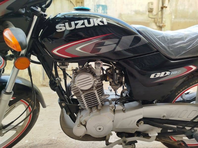 Suzuki 110 condition new 1000 km register Karachi 3