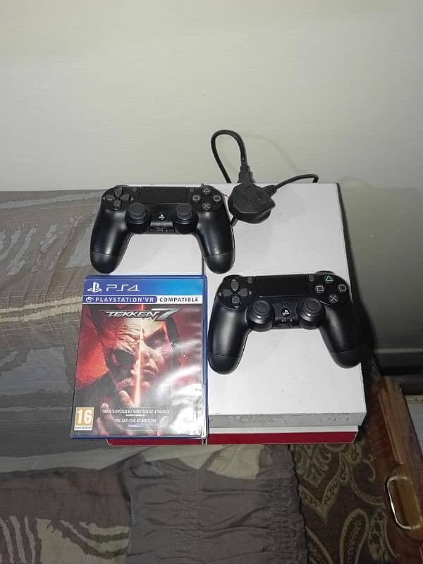 PS4 console with 2 brand new controllers 2