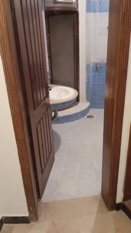 "Rent a Spacious 2-Bedroom Basement in E-11 Islamabad 1 Kanal" 7