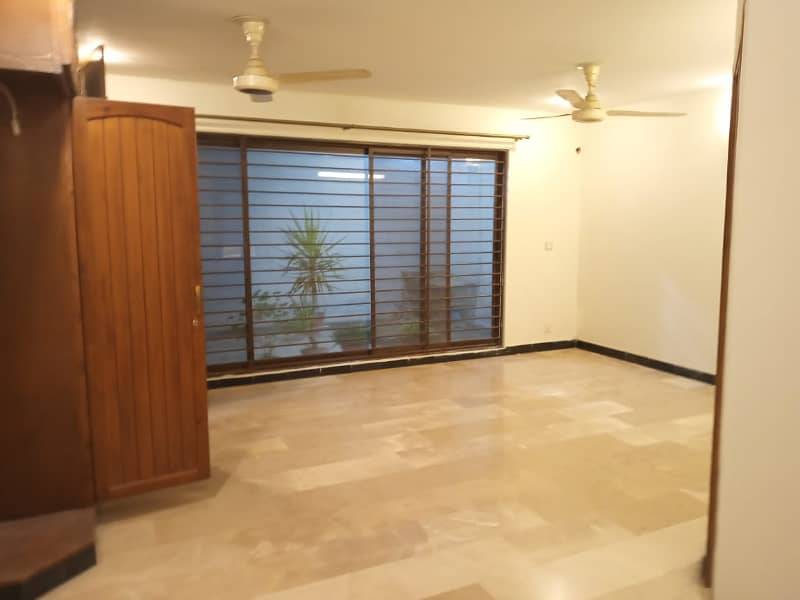 "Rent a Spacious 2-Bedroom Basement in E-11 Islamabad 1 Kanal" 9