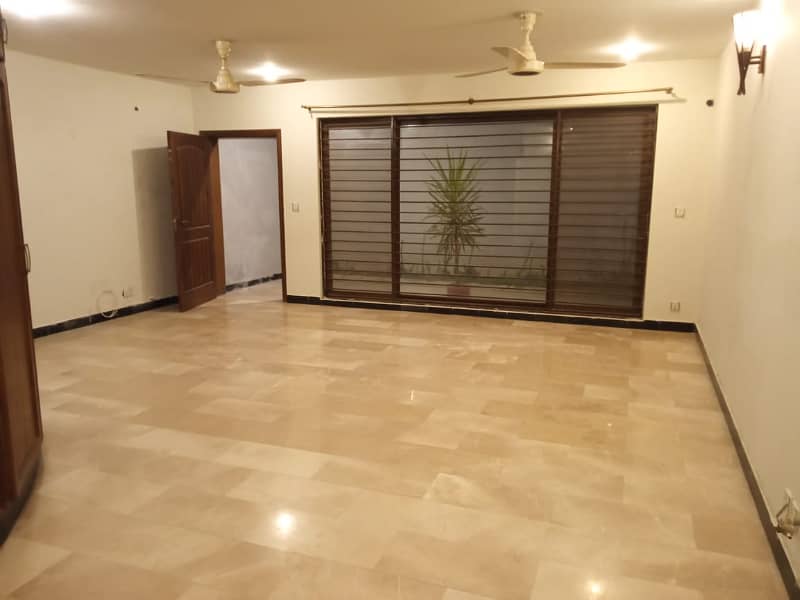 "Rent a Spacious 2-Bedroom Basement in E-11 Islamabad 1 Kanal" 13