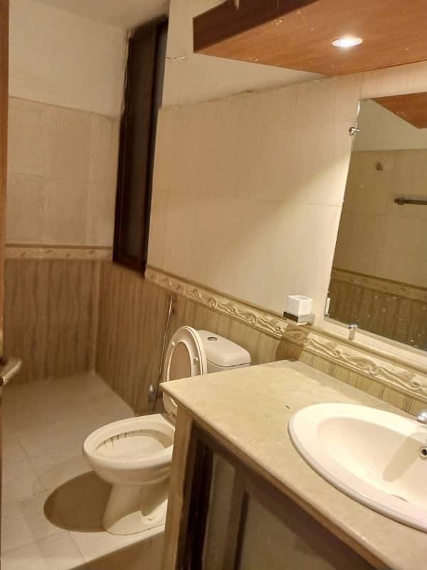 "Rent a Spacious 2-Bedroom Basement in E-11 Islamabad 1 Kanal" 14