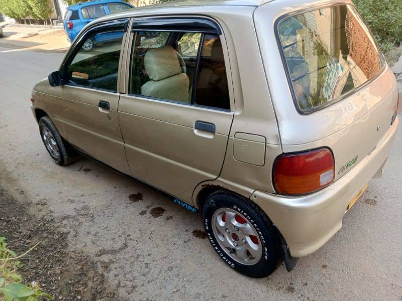 Daihatsu Cuore 2010 ful original 03032002147 7