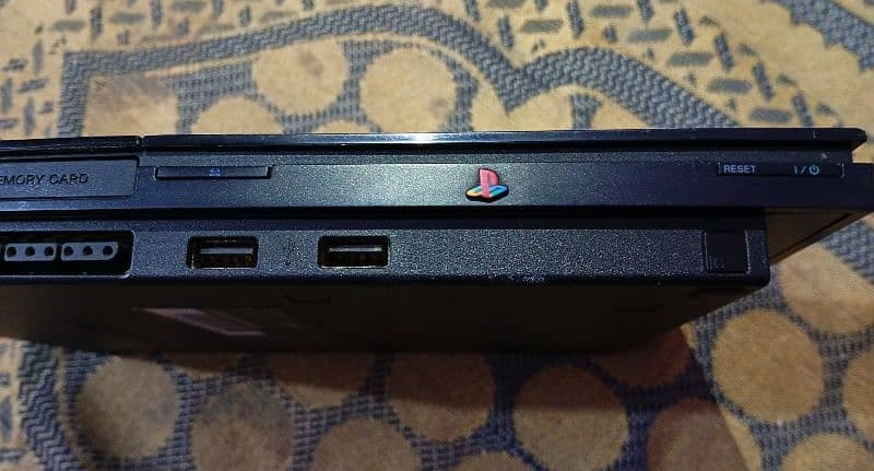 PlayStation2 (PS2)with (32)GB USB new condition KSA imported 7