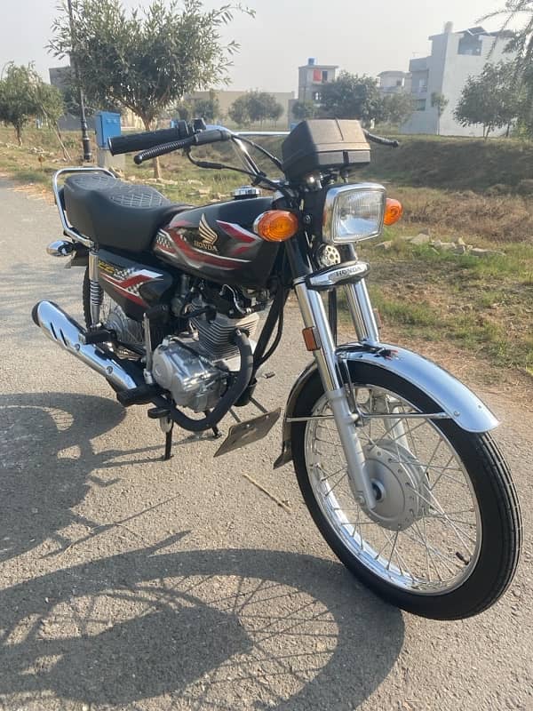 Honda 125 2900 chala number b laga paper b laga seat b poshish hovi ha 1