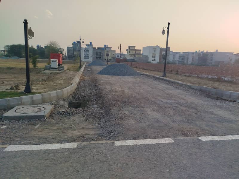 3 Marla Beautiful Plot on ground Pine Enclave Phase 3 near Mohafiz town phase2 and DHA Rahbar and audit account lahore 5