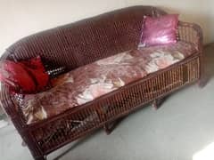 cane sofa