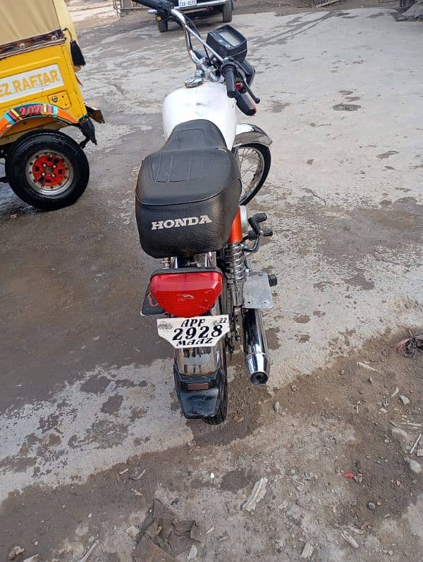 United 70cc for sale with original tank and side covers. 3