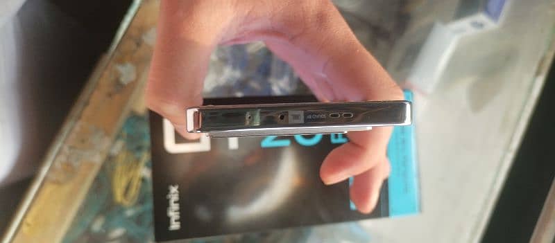 infinix gt20 pro 12+12 256 used like new with original box and charger 7