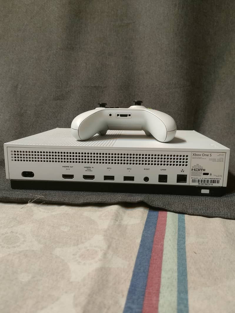 Xbox one s 1tb with 10 games . 2