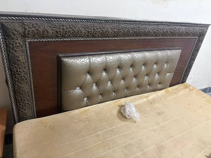 leather style bed and wooden 0