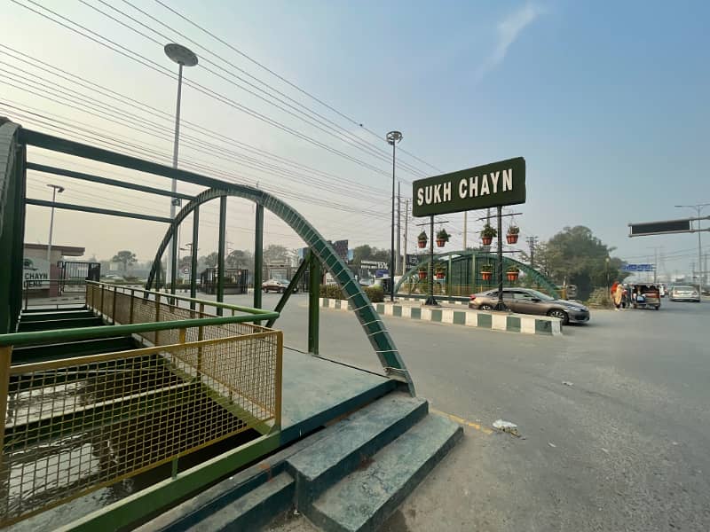 10 Marla Plot For Sale In Sukh Chayn Gardens Near Bahri Town Lahore 0