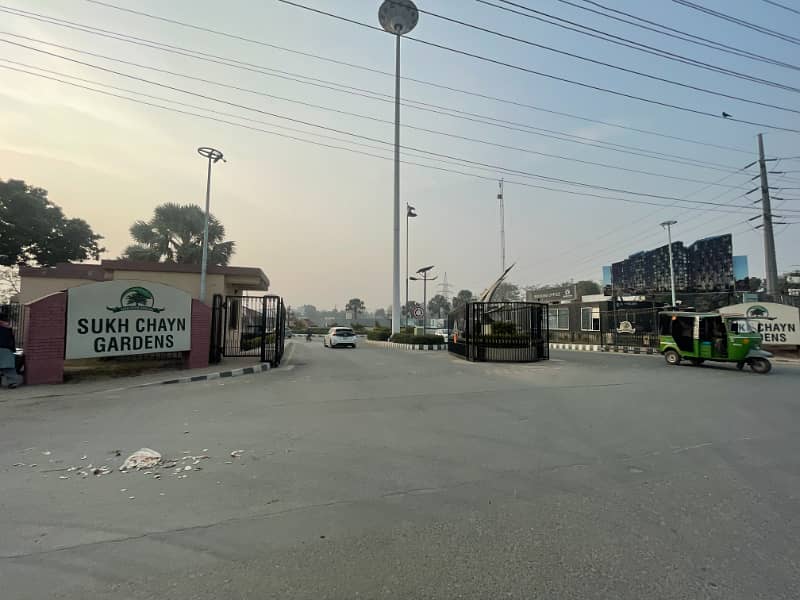 10 Marla Plot For Sale In Sukh Chayn Gardens Near Bahri Town Lahore 1