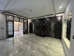 10 Marla Brand New House For Rent In Wapda Town.