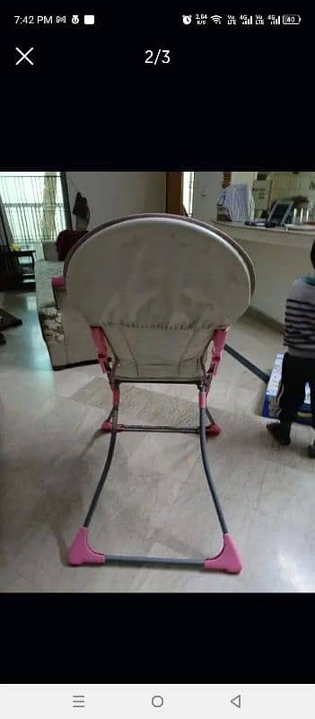 Baby high chair. good condition. music on 1