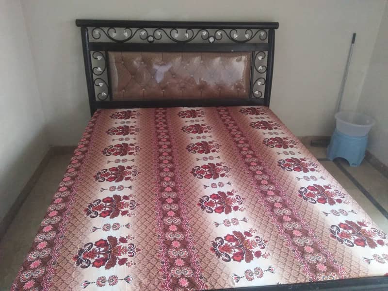 Rod iron bad with new mattress for sale 0