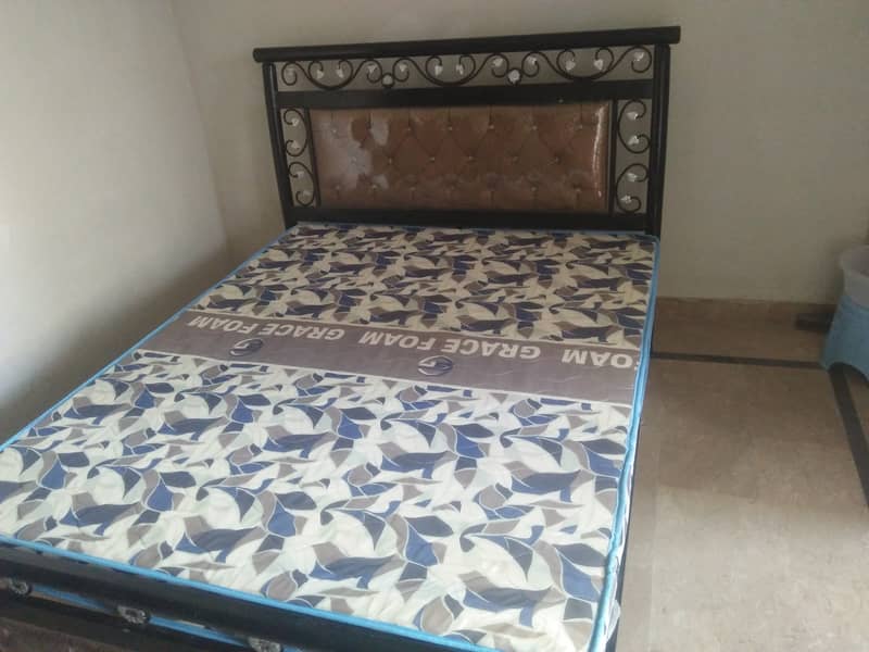 Rod iron bad with new mattress for sale 2