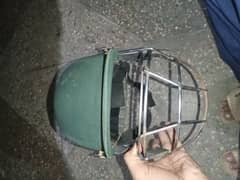 Cricket pads and helmet