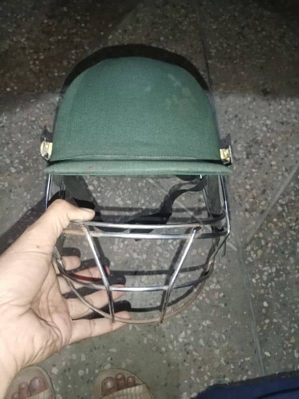 Cricket pads and helmet 4