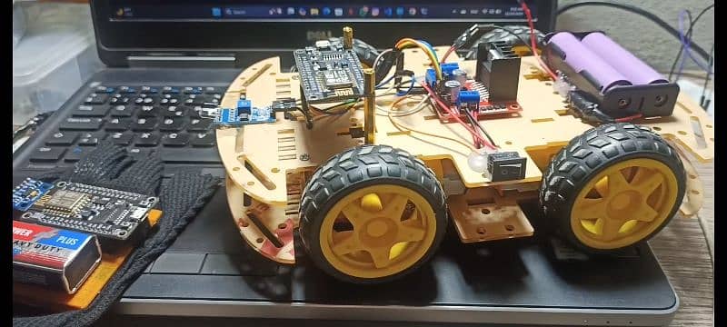 Gesture controlled plus obstacle avoiding robotic car for students 2