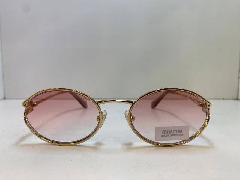 Women Sunglasses:MIU MIU SMU52Y , Police S1587q 0