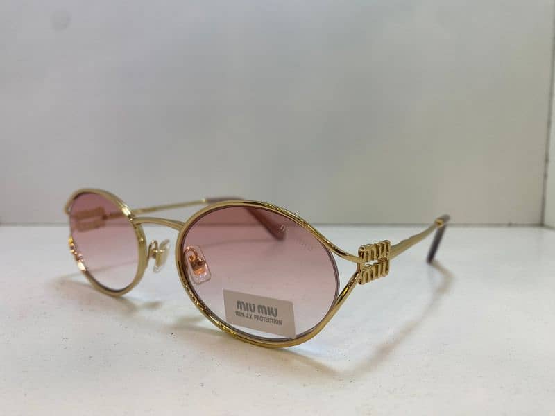 Women Sunglasses:MIU MIU SMU52Y , Police S1587q 1