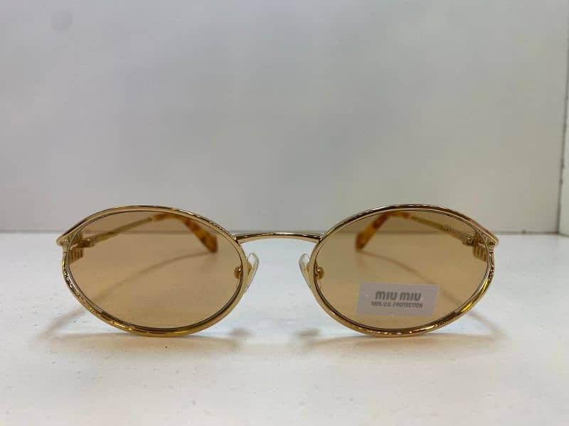 Women Sunglasses:MIU MIU SMU52Y , Police S1587q 4