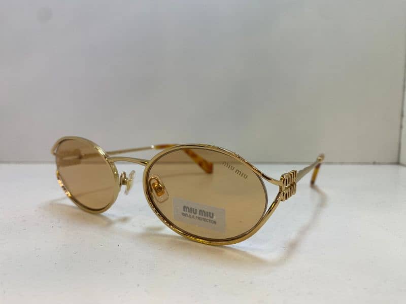 Women Sunglasses:MIU MIU SMU52Y , Police S1587q 5