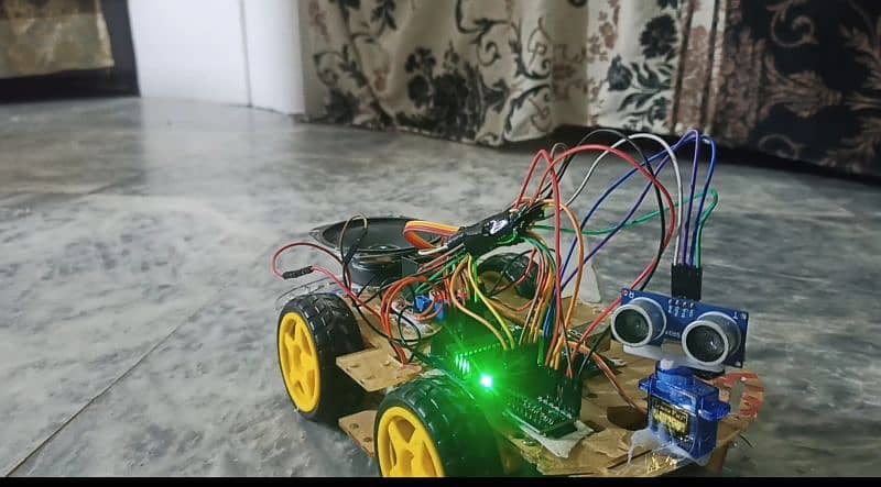 Obstacle avoiding plus speakable intelligent robotic car for projects 0