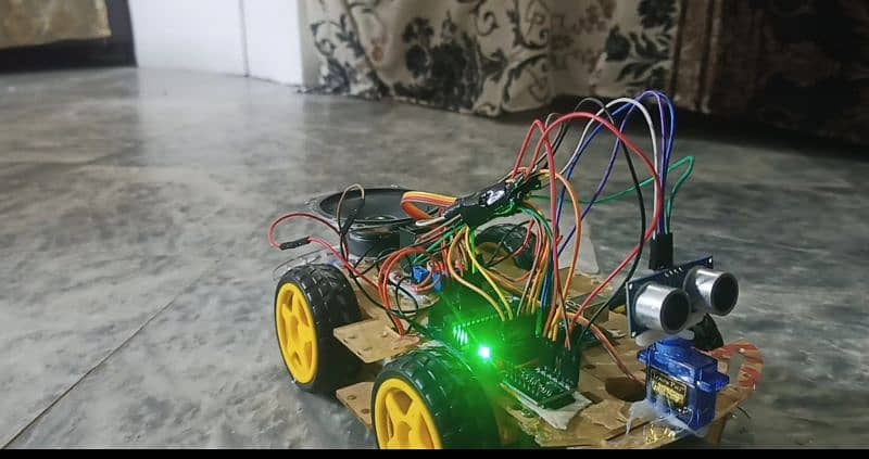 Obstacle avoiding plus speakable intelligent robotic car for projects 1