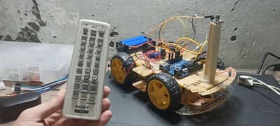 TV remote controlled robotic car for students projects Arduino based