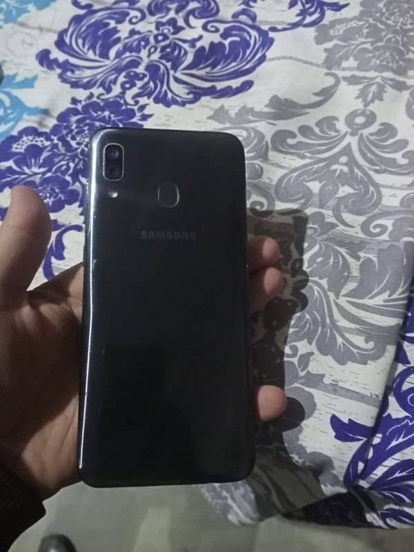 Samsung a30   4/64  ak sim PTA approved hy ak PTA sy band ha ak sim ok 1