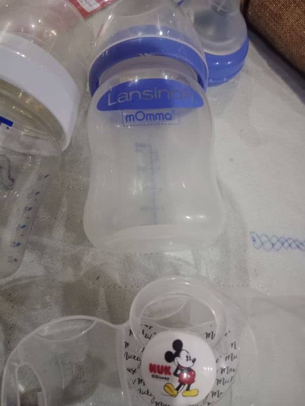 Imported Branded Feeding Bottle with extra nipples 9