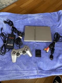 PlayStation 2 Silver With Box Original controller brand new condition