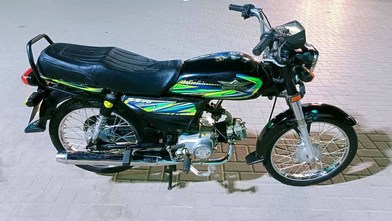 Super star 2022 11 month Karachi num 1st owner Genuine condition. 2