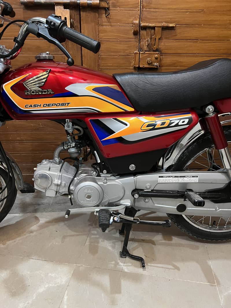 Honda CD 70 2024 4