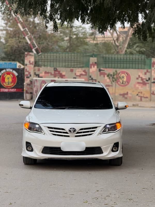 Toyota Corolla Altis SR 2010 model 2011 reg 1st owner Super white 1