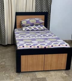 Single Wooden Bed with drawers nd Boxes  almost New