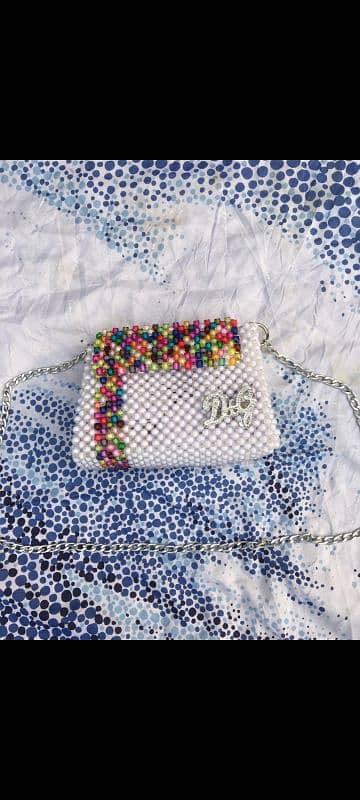 white multi colour beaded bag 50% off urgent sell 0