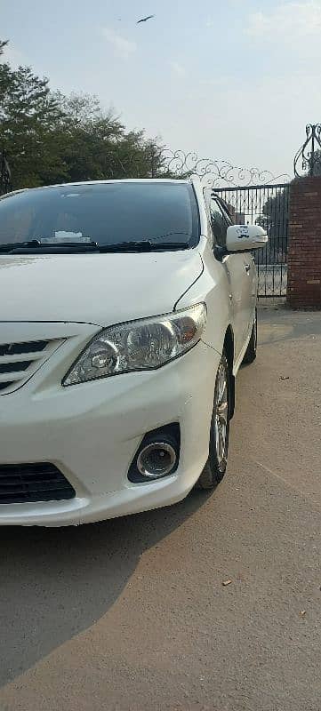 Toyota Corolla XLI 2012 white total orignal 1