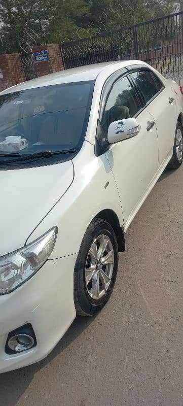 Toyota Corolla XLI 2012 white total orignal 2