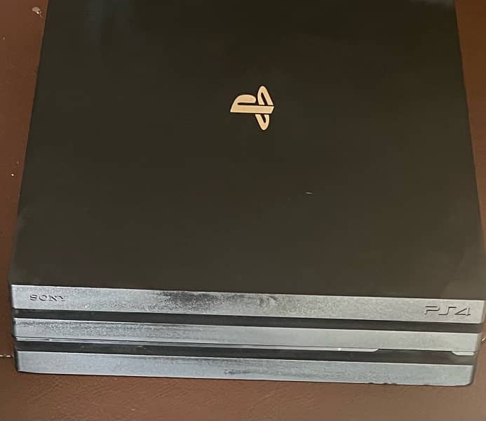 PS4 Pro 1TB with original PS4 controller 0