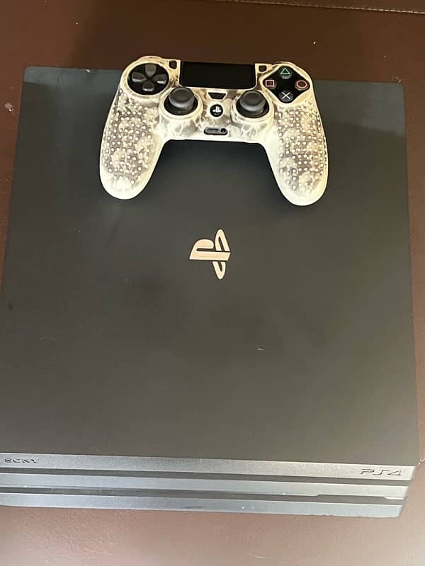 PS4 Pro 1TB with original PS4 controller 1