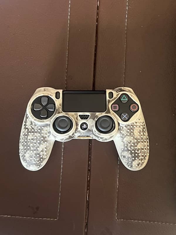 PS4 Pro 1TB with original PS4 controller 2