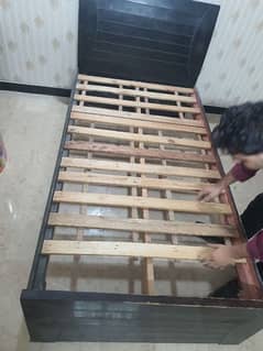 wooden single bed