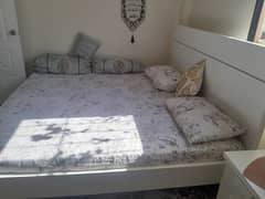 king bed with side table