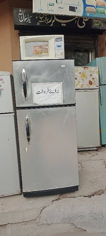 Haire fridge and Dawlance oven for sale 0