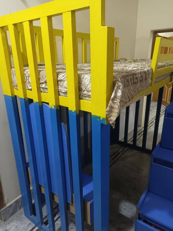 Bunk bed with mattress, ladder, cabinets and study cabin 5