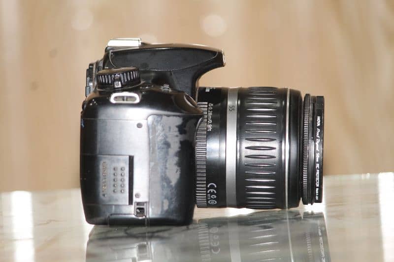 1000d canon with 18-55mm lens and all accessories 3